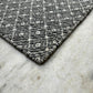 Gray & White Diamond Handwoven Wool Flat Weave Rug — side-angle view, Lav & Lira handmade rug