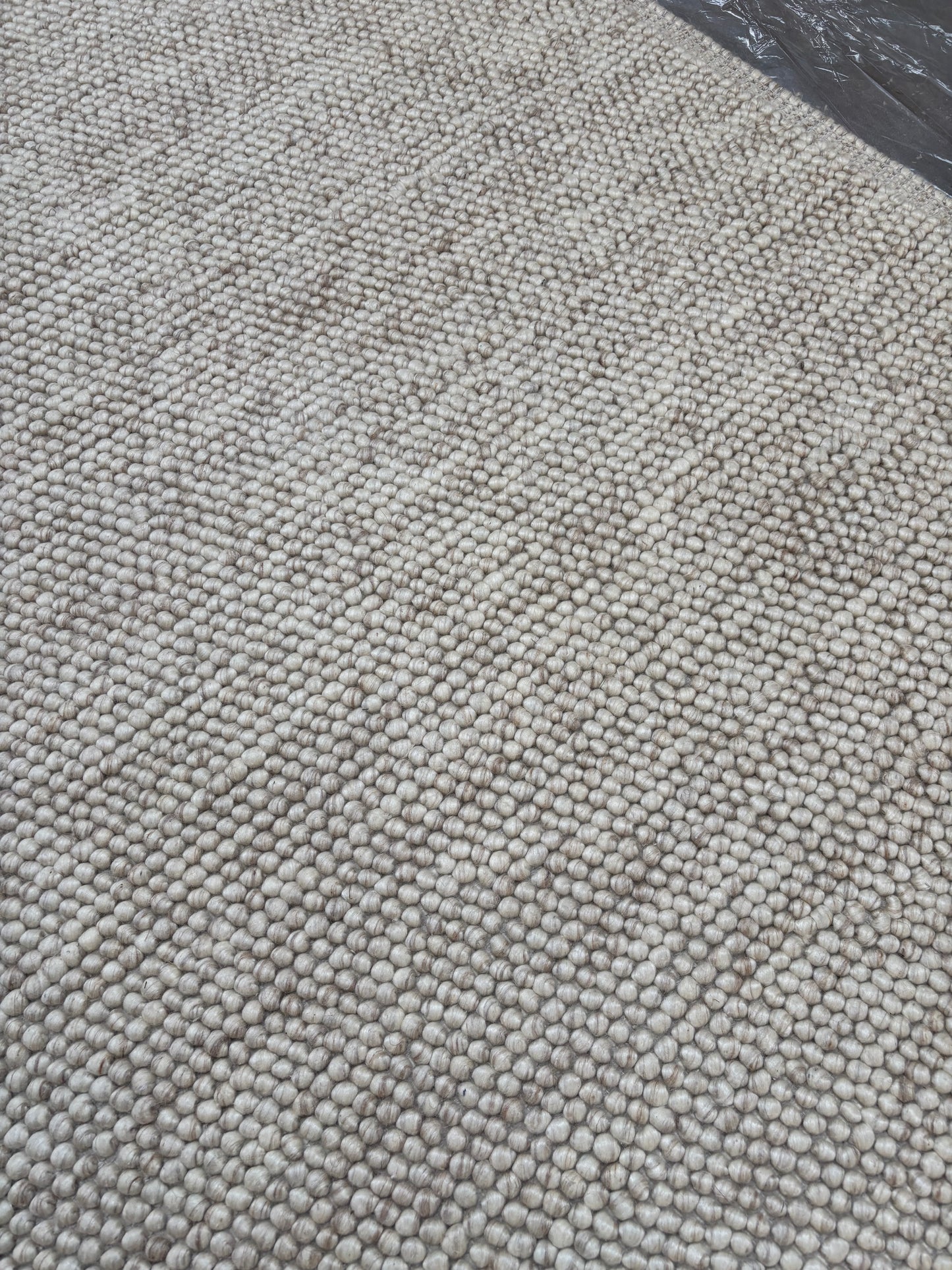handwoven chunky loop wool area rug beige cream with border full view custom size natural wool Lav and Lira