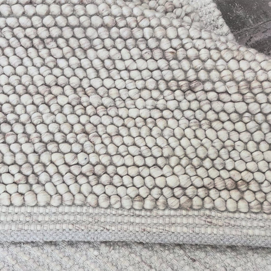 chunky loop beige cream wool rug in neutral living room interior design custom size handwoven Lav and Lira New York